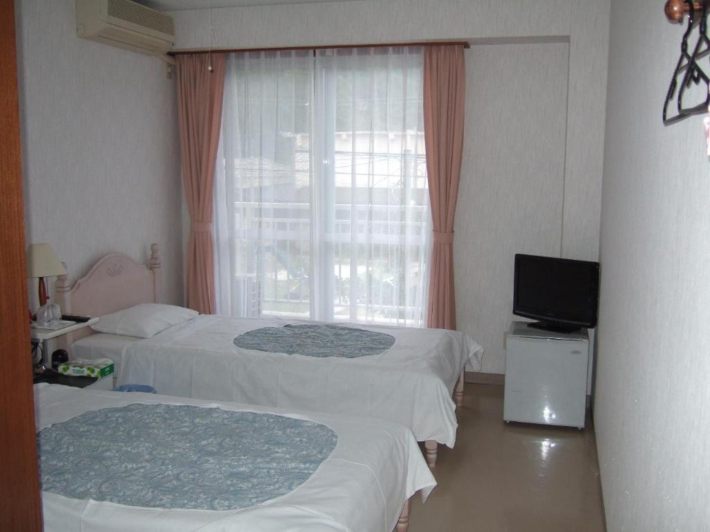 Pension Takatsuki Zamami Δωμάτιο φωτογραφία
